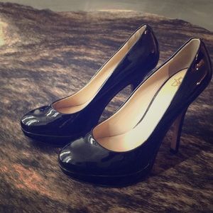 Black patent leather pumps